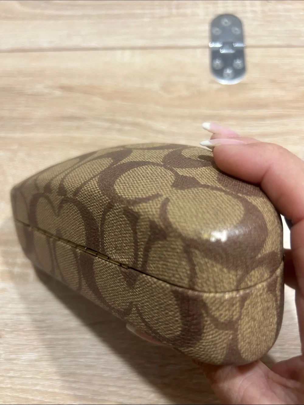Coach hard shell sunglass case.